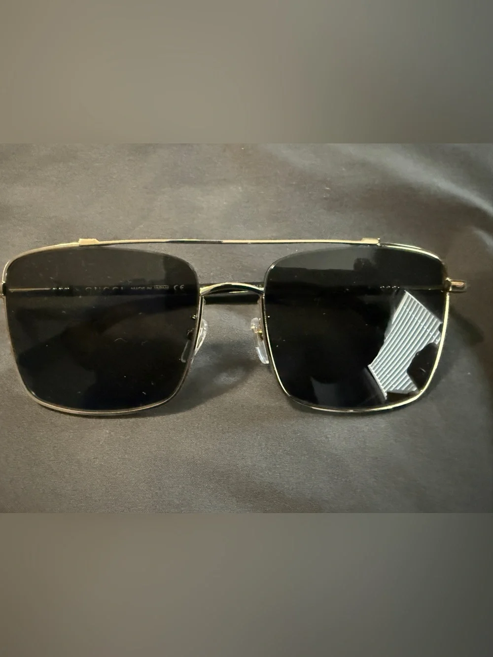 Gucci GG0610SK men’s square/caravan-style metal frame sunglasses